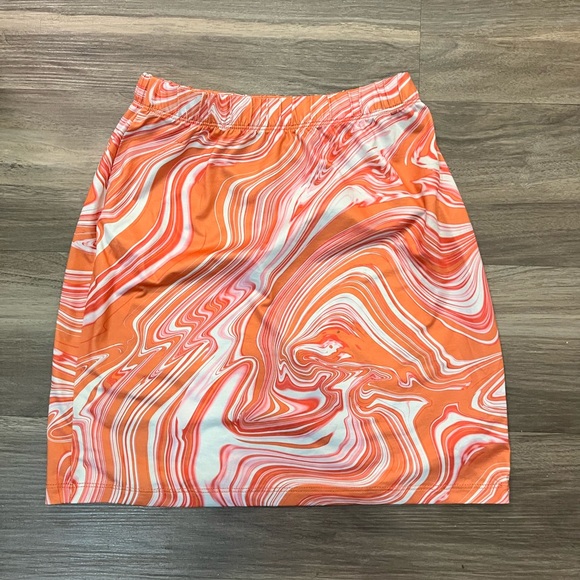 Orange and pink skirt on a size extra small. - Picture 2 of 4